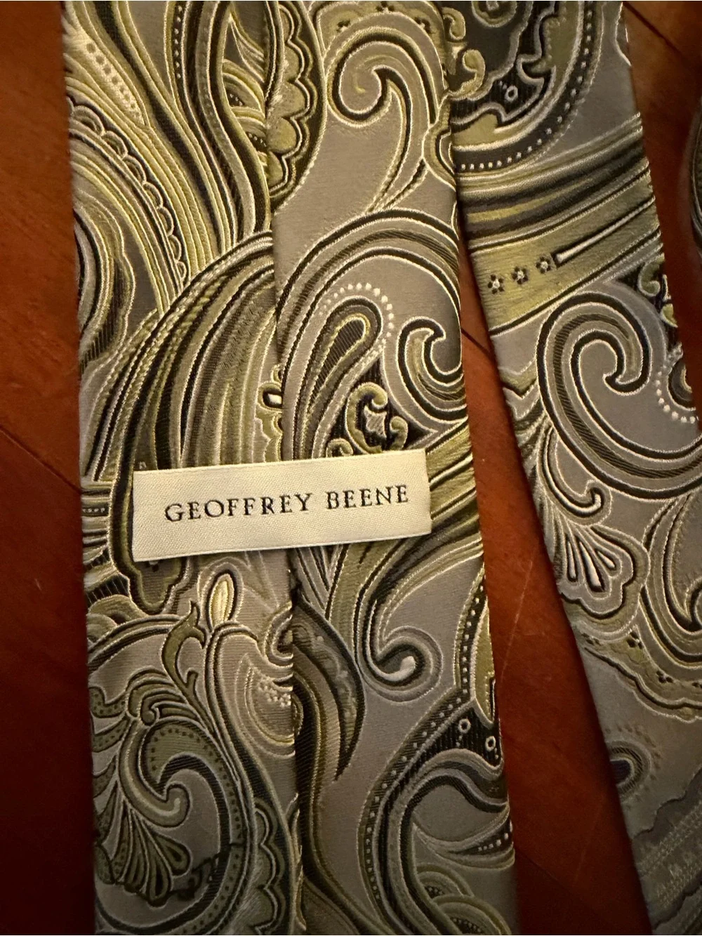 Four Ties including Geoffrey Beene and Paisley Silk
